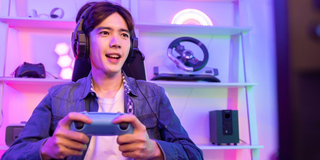 Young person gaming with headphones on