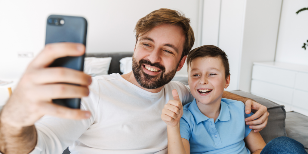 Parent and child take a selfie