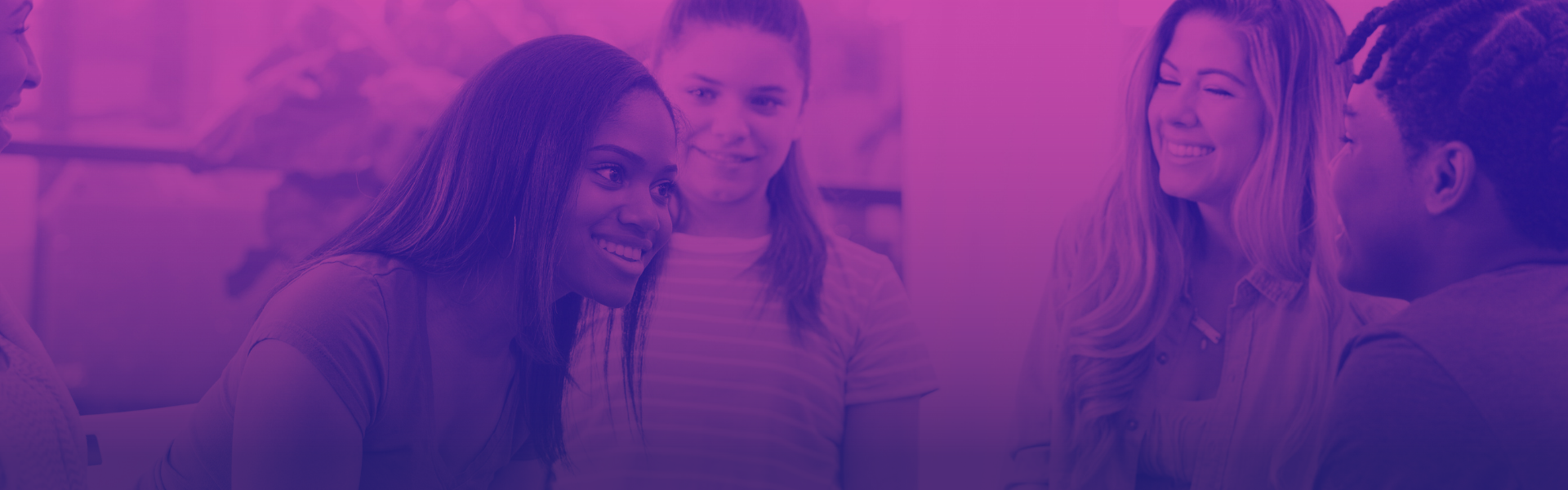 Four young women in conversation