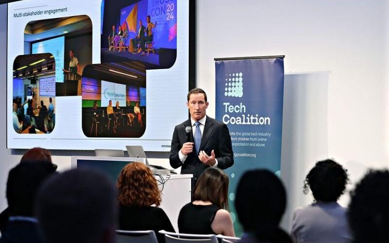 A speaker presents at the event