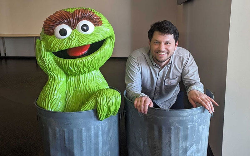 Sam in a garbage can next to Oscar